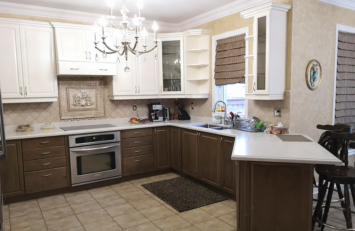 Two toned, white and brown, painted kitchen cabinets in Brampton, Toronto