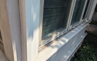 Painting window frame exterior in Toronto: paint chipping off a wood window frame.