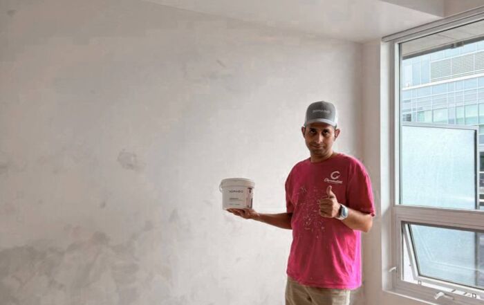 Bedroom accent wall painted with warm, boho-toned limewash in a Benjamin Moore color, showcasing Limewash Painting Services in Toronto.