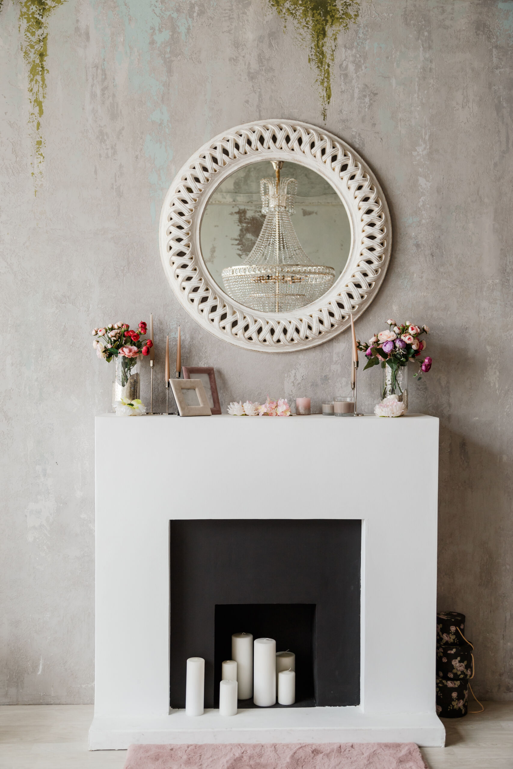 A luxurious fireplace wall finish in Venetian plaster with a smooth, polished surface, enhancing the elegance of a modern living room in Toronto.