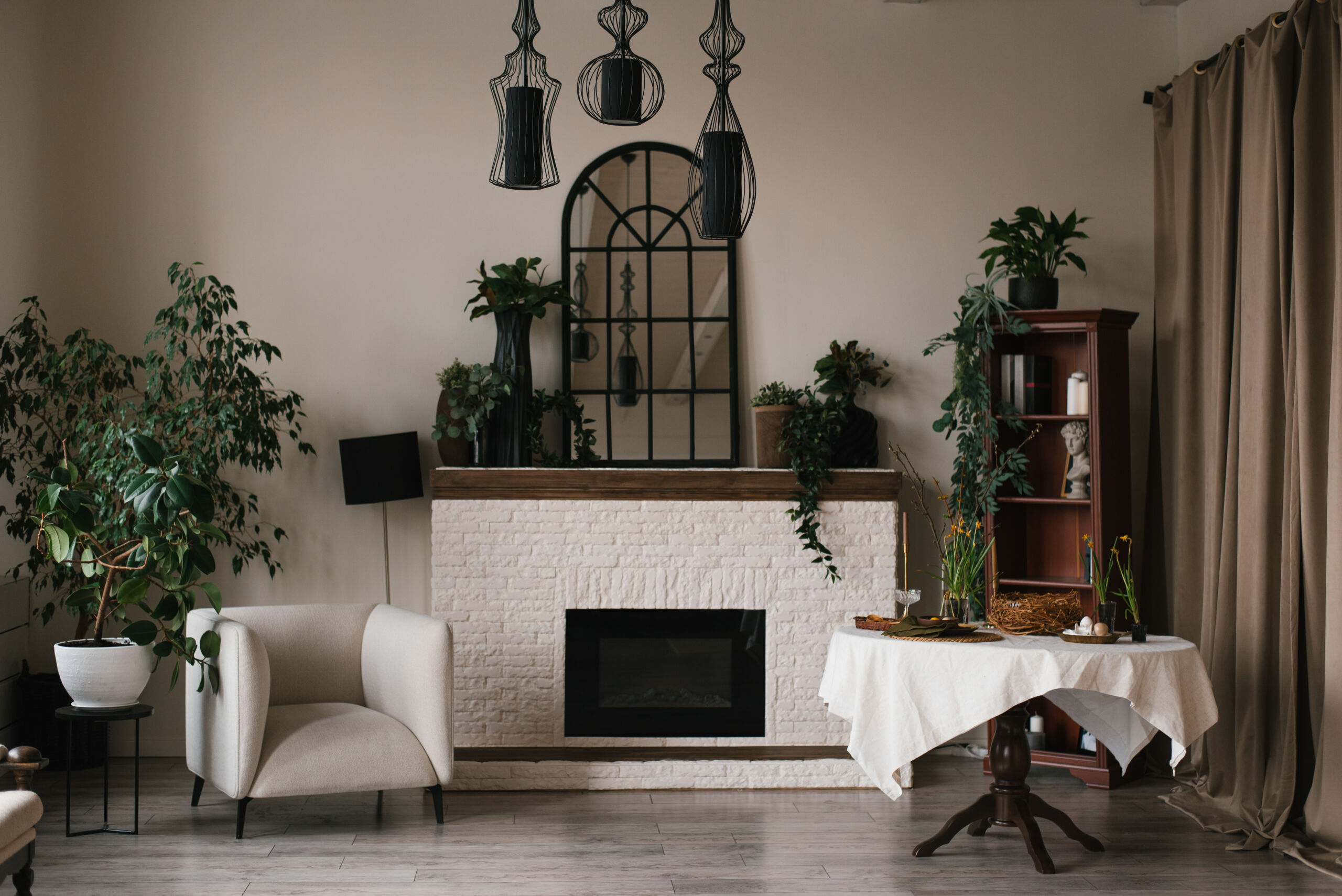 A rustic fireplace wall finish in limewash paint with a soft, textured look, adding warmth and character to a cozy living room in Toronto.