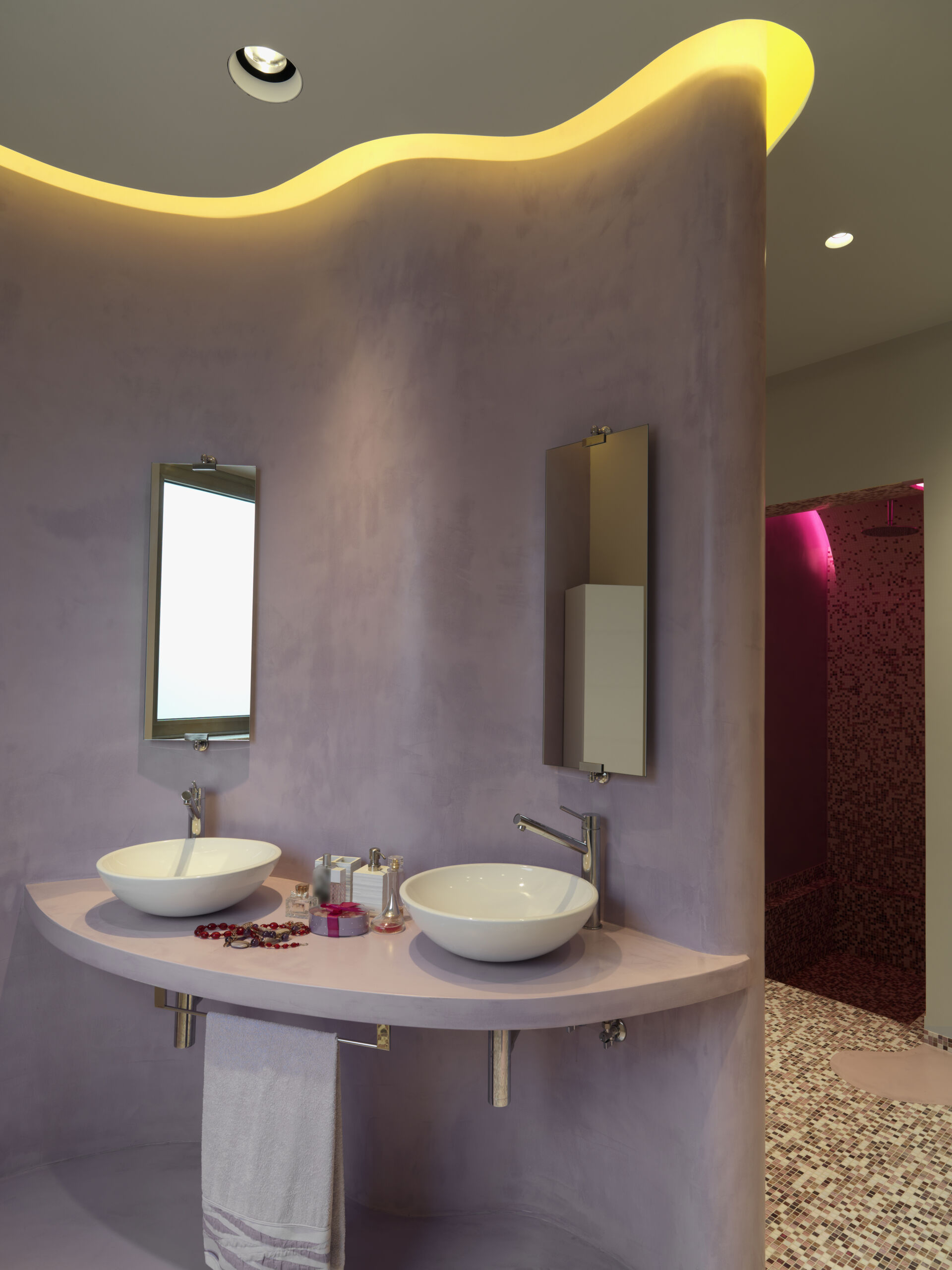 Venetian plaster walls in a washroom of a downtown Toronto, in a dirty pink colour