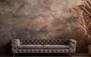 Dark loft interior featuring a trendy, stylish multi-color Venetian plaster finish with a polished look