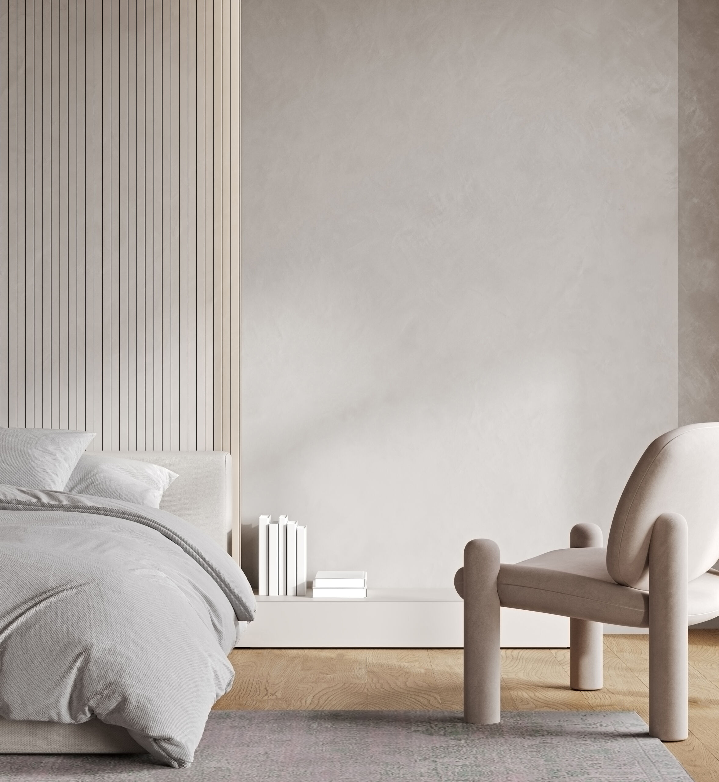 Limewash textured wall in a bedroom with a boho design in light gray color