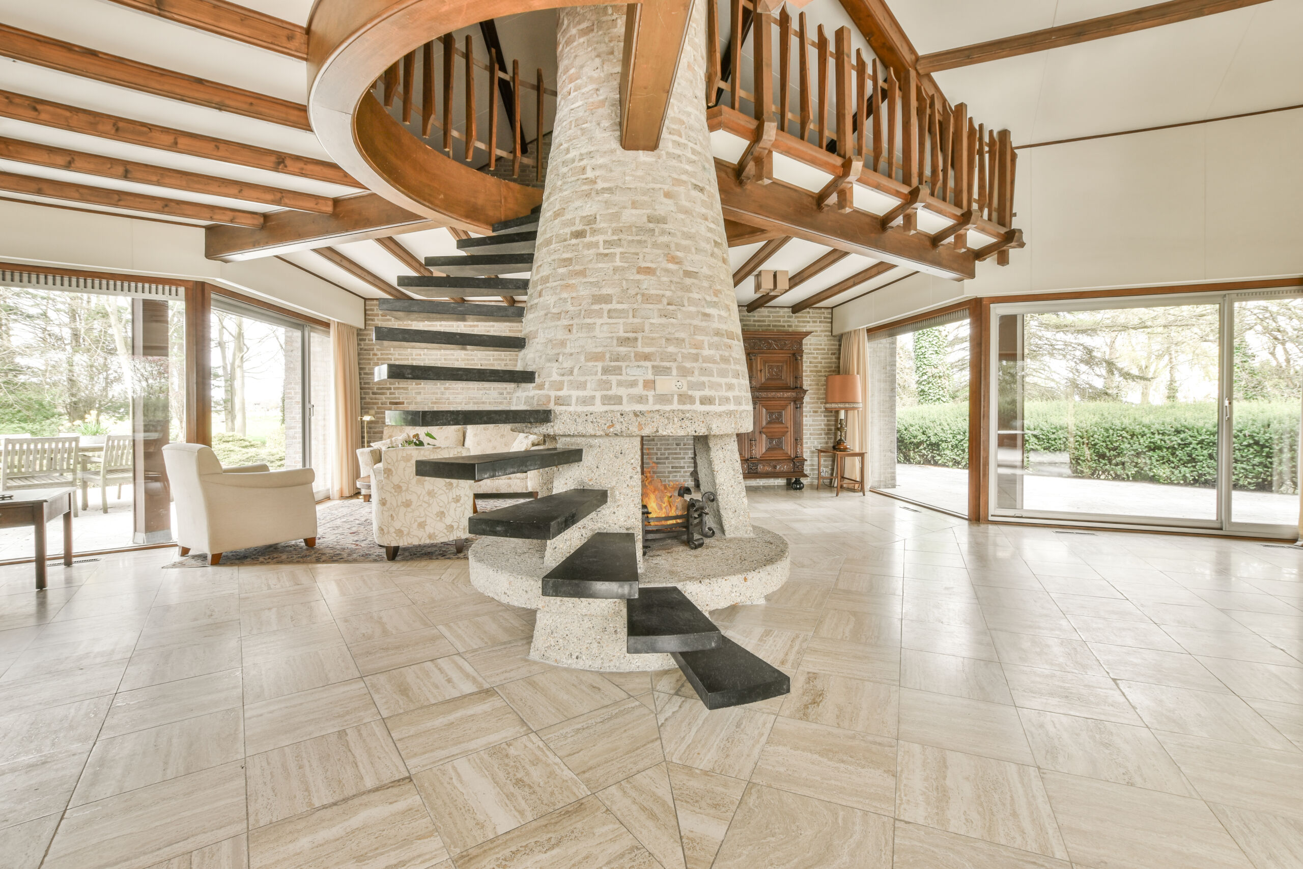 Cozy cottage fireplace in Muskoka finished with limewash, adding a soft, rustic charm to the stone.