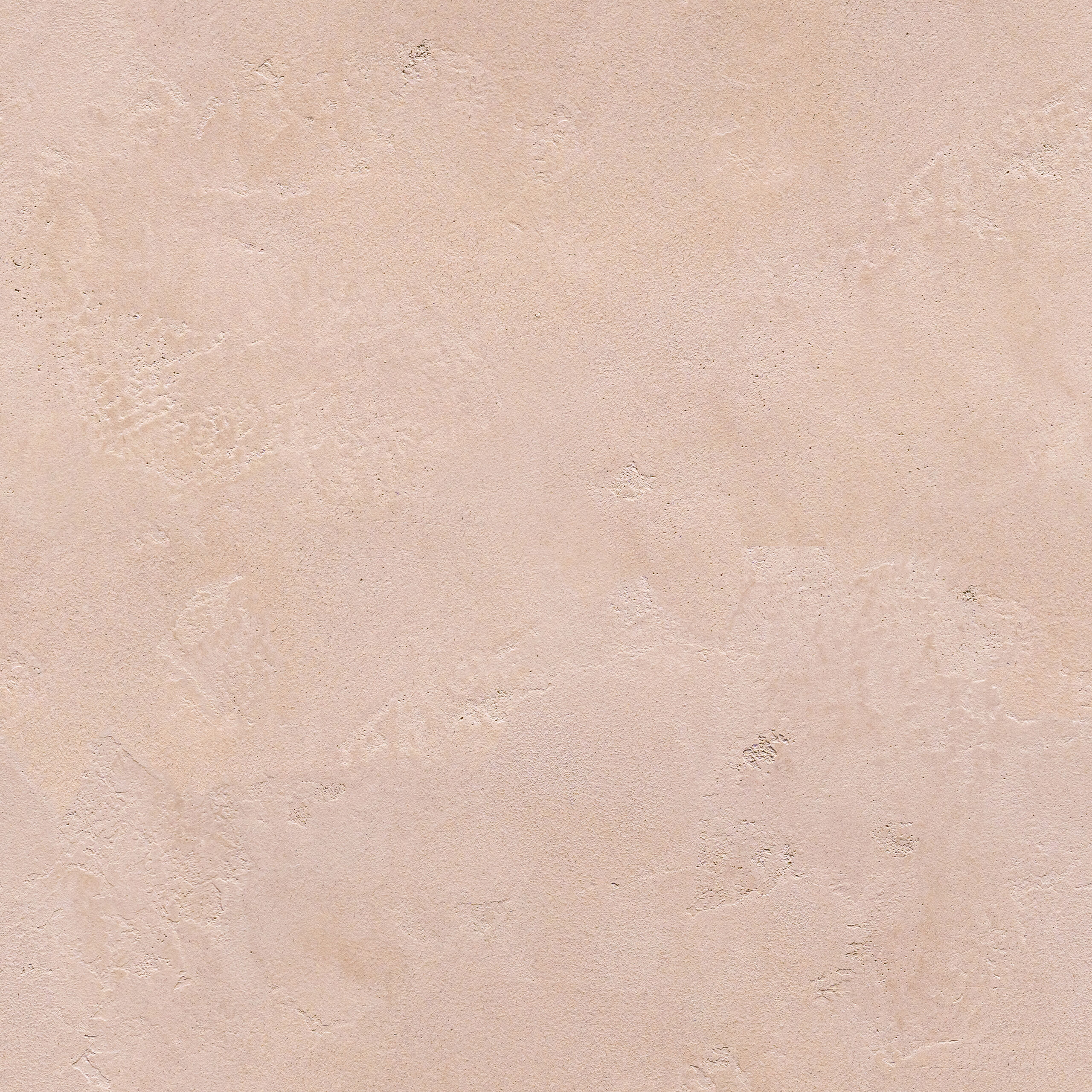 Close-up of a range hood finished in soft pink Venetian plaster, showcasing a smooth texture and delicate pastel hue that adds warmth and elegance to the kitchen.