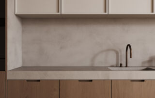 Kitchen with beige-grey microcement applied over tiles on the backsplash and countertop, creating a seamless modern finish.